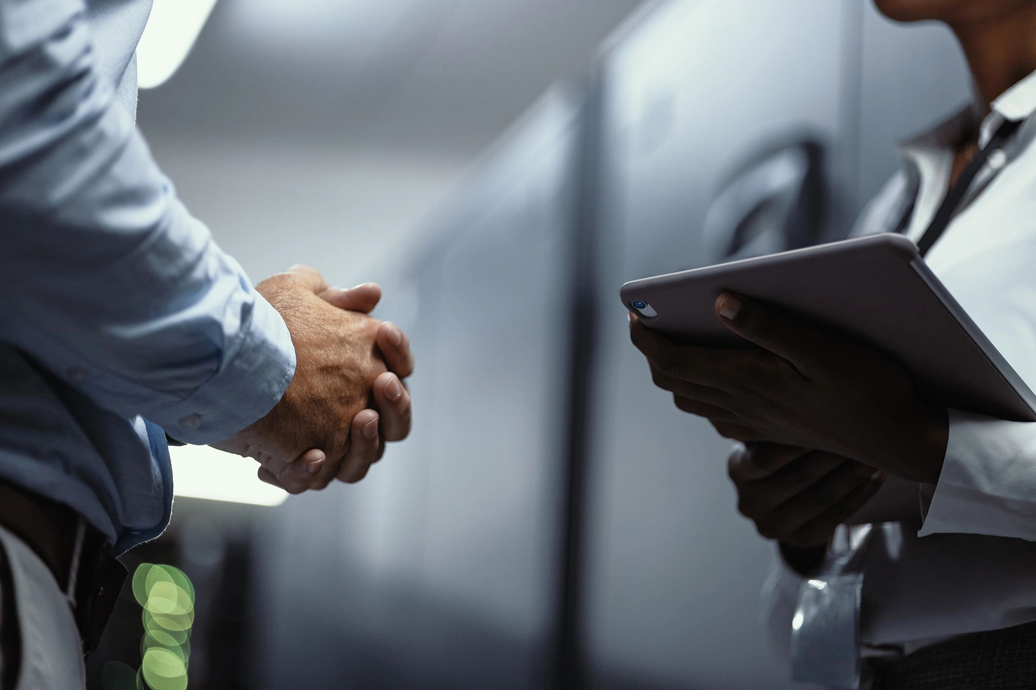 business people handshake technology